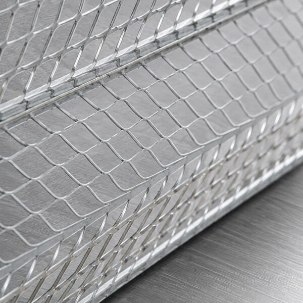 Close-up of galvanised Rib Lath Sheet showing raised ribs and expanded metal mesh
