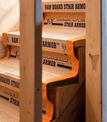 Ram Board Stair Armor protecting stairs during construction work